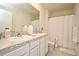 Bathroom with double vanity and shower/tub combo at 1239 Berry Ln, Davenport, FL 33837