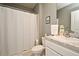 Clean bathroom with shower/tub combo and granite countertop at 1239 Berry Ln, Davenport, FL 33837
