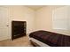 Small bedroom with twin bed and closet at 1239 Berry Ln, Davenport, FL 33837