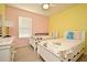 Bedroom with two twin beds at 1239 Berry Ln, Davenport, FL 33837