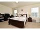 Spacious bedroom with a large bed and plenty of natural light at 1239 Berry Ln, Davenport, FL 33837