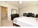 Spacious bedroom with ensuite bathroom and home office at 1239 Berry Ln, Davenport, FL 33837