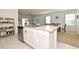 Dining room with white table and wicker chairs at 1239 Berry Ln, Davenport, FL 33837