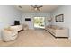 Bright Gathering room with sliding glass doors leading to the backyard at 1239 Berry Ln, Davenport, FL 33837