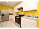 Kitchen with white cabinets and granite countertops at 1239 Berry Ln, Davenport, FL 33837