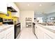Kitchen with island and stainless steel appliances at 1239 Berry Ln, Davenport, FL 33837