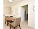 Small office space with a round table and built-in shelving at 1239 Berry Ln, Davenport, FL 33837