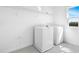 Bright laundry room with new washer and dryer at 1509 August Gray Dr, Kissimmee, FL 34744