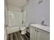 Bright bathroom with tub and shower and modern vanity at 1921 Drum Dr, Kissimmee, FL 34759