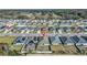Residential community aerial view showcasing well-spaced homes and manicured landscapes at 1944 Harvest Landing Cir, Lakeland, FL 33810