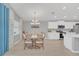 Bright dining room features a spacious table with seating for six at 1944 Harvest Landing Cir, Lakeland, FL 33810