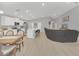 Modern kitchen with white cabinets and an island at 1944 Harvest Landing Cir, Lakeland, FL 33810