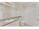 Clean bathroom with tub, toilet and vanity at 211 Longview Ave # 209, Celebration, FL 34747