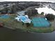 Community pool, tennis courts, and other amenities at 2201 Club Cir # 2201, Lake Wales, FL 33898