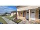 Inviting exterior featuring well-maintained landscaping and a charming entryway for a welcoming appeal at 2201 Club Cir # 2201, Lake Wales, FL 33898