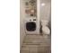 Laundry area with washer, dryer, and extra storage at 2201 Club Cir # 2201, Lake Wales, FL 33898