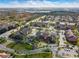 Aerial view of apartment community with ample parking and landscaping at 2203 Key West Ct # 435, Kissimmee, FL 34741
