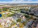 Scenic aerial view of a residential community with lush landscaping, swimming pool, and ample parking at 2203 Key West Ct # 435, Kissimmee, FL 34741