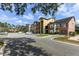 Apartment building showcasing multiple units and parking area at 2203 Key West Ct # 435, Kissimmee, FL 34741