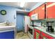 Bright kitchen with colorful cabinets, modern appliances, and ample counter space at 2203 Key West Ct # 435, Kissimmee, FL 34741