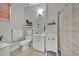 Bright bathroom featuring a vanity, toilet and tub-shower combination at 2849 Shelburne Way, St Cloud, FL 34772