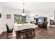 Bright dining area with access to the backyard and an open floor plan at 3027 Serendipity Way, Davenport, FL 33896