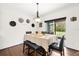 Bright dining room with table, chairs, and access to backyard patio at 3027 Serendipity Way, Davenport, FL 33896