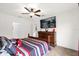 Spacious main bedroom with king-size bed and large TV at 3027 Serendipity Way, Davenport, FL 33896