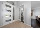 Bright entryway with white door and view into living area at 3040 Cardillino Way, Kissimmee, FL 34741