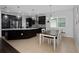 Eat-in kitchen features a large island and modern finishes at 3040 Cardillino Way, Kissimmee, FL 34741
