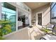 Relaxing screened porch with sliding glass doors leading to backyard at 3040 Cardillino Way, Kissimmee, FL 34741