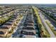 A stunning aerial panorama of a well-planned community adjacent to a bustling highway at 350 Pendant Ct, Kissimmee, FL 34747