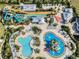 Overhead view of waterpark complex including pools, slides, recreational areas, and lounge chairs at 350 Pendant Ct, Kissimmee, FL 34747