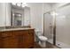 Bright bathroom featuring granite countertops, and a glass door shower at 350 Pendant Ct, Kissimmee, FL 34747