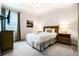Cozy bedroom featuring plush carpet, stylish decor, and ample natural light at 350 Pendant Ct, Kissimmee, FL 34747
