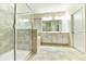 Elegant bathroom with double vanity, large shower, and soaking tub at 4310 Seven Canyons Dr, Kissimmee, FL 34746
