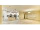 Open concept kitchen with island, stainless steel appliances, and white cabinetry at 4310 Seven Canyons Dr, Kissimmee, FL 34746