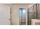 Bathroom with a glass door shower at 4571 Tribute Trl, Kissimmee, FL 34746