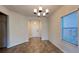 Welcoming entryway featuring tile floors, natural light, and views into the living spaces at 4571 Tribute Trl, Kissimmee, FL 34746