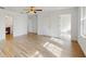 Bright bedroom featuring wood-look flooring and neutral walls at 4855 Lillian Black Rd, St Cloud, FL 34771