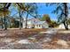 A charming home nestled among trees and expansive grounds, offering privacy and natural beauty at 4855 Lillian Black Rd, St Cloud, FL 34771