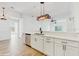 Contemporary kitchen featuring white cabinets and quartz counters with stainless steel appliances at 4855 Lillian Black Rd, St Cloud, FL 34771