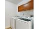 Laundry room with modern Samsung washer and dryer at 4855 Lillian Black Rd, St Cloud, FL 34771