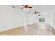 Spacious living room featuring hardwood floors, and a ceiling fan at 4855 Lillian Black Rd, St Cloud, FL 34771