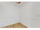 A simple room featuring clean walls, chair rail, baseboards, and wood-look tile flooring at 4855 Lillian Black Rd, St Cloud, FL 34771