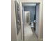 Clean bathroom with gray walls and hexagonal tile floors at 626 Baldwin Dr, Kissimmee, FL 34758
