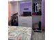 Bedroom with built-in wardrobe and Eiffel Tower bedding at 626 Baldwin Dr, Kissimmee, FL 34758