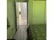 Bedroom with door leading to another room and plenty of space at 626 Baldwin Dr, Kissimmee, FL 34758
