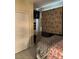 Bright bedroom with a large window, tile floors, and modern fixtures at 626 Baldwin Dr, Kissimmee, FL 34758