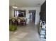 Bright dining room with a table and chairs, looking toward the living room at 626 Baldwin Dr, Kissimmee, FL 34758